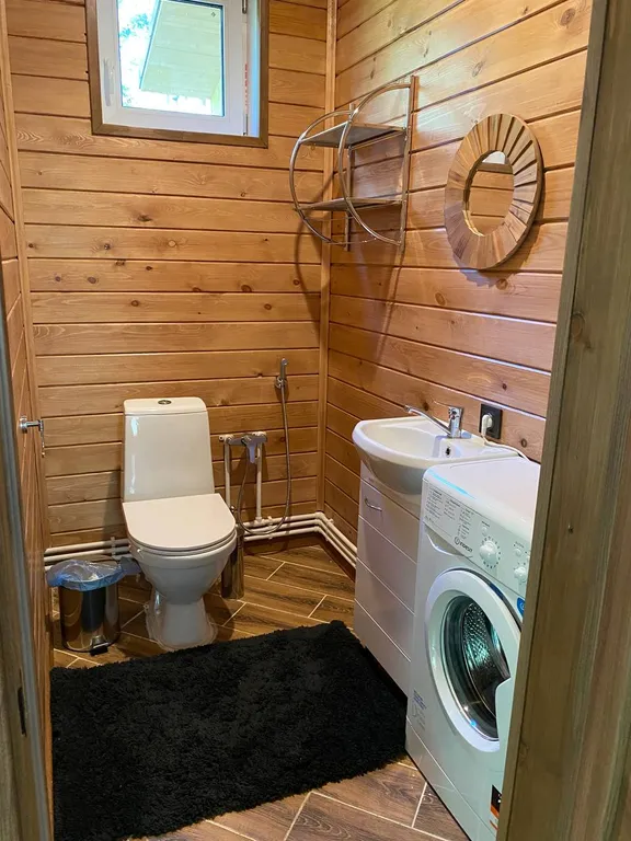 Комфортабельный коттедж с сауной на берегу водоема