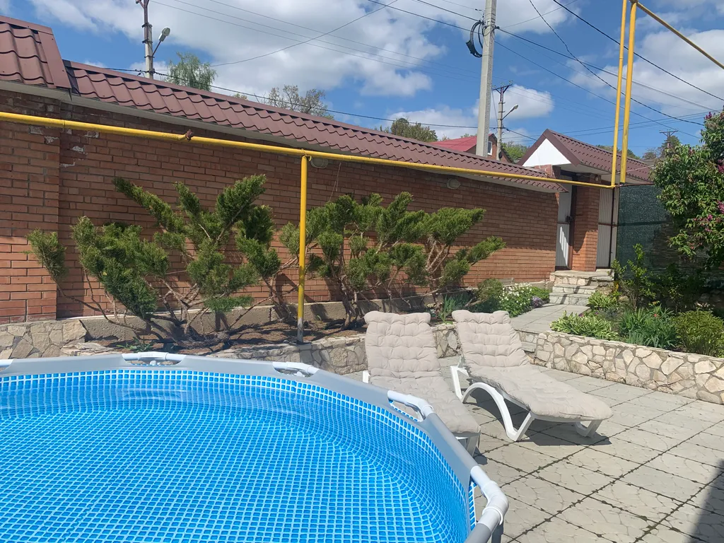 Уютный дом с можжевельником