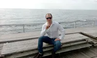 Николай