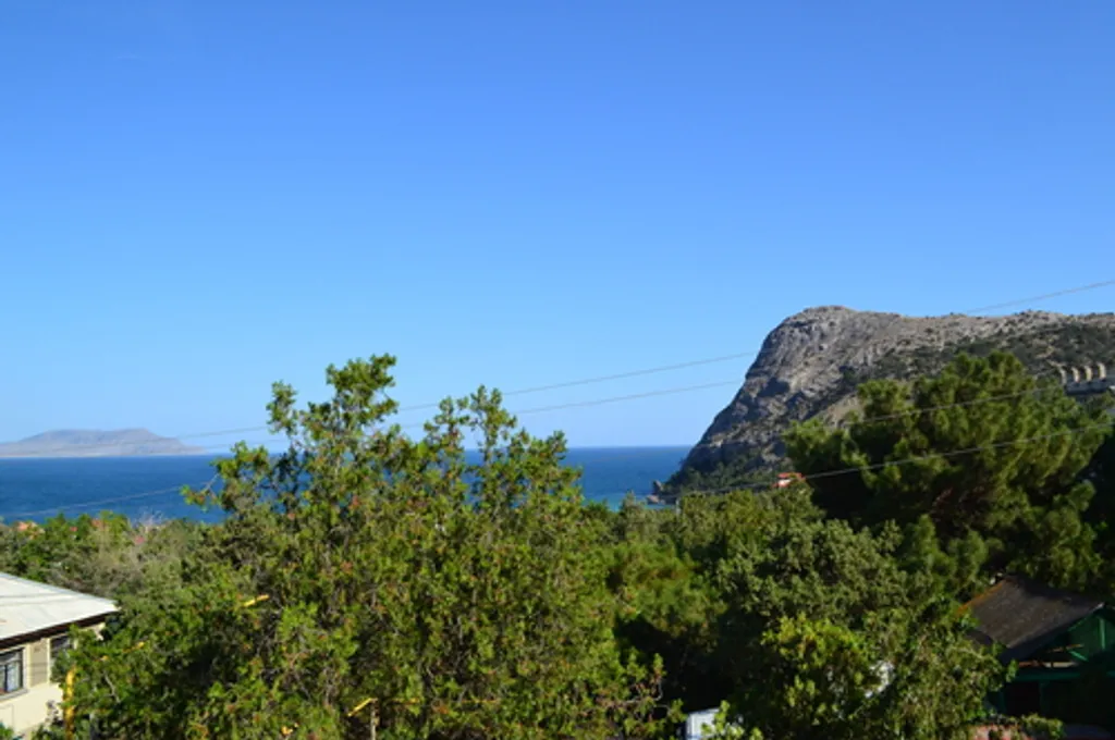 Апартамент с видом на море и горы