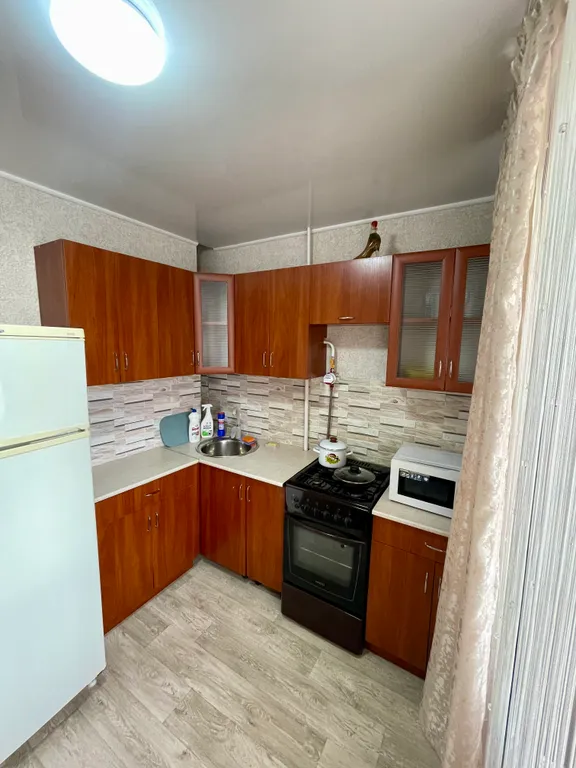 Уютная квартира в центре города с красивым видом города из окна