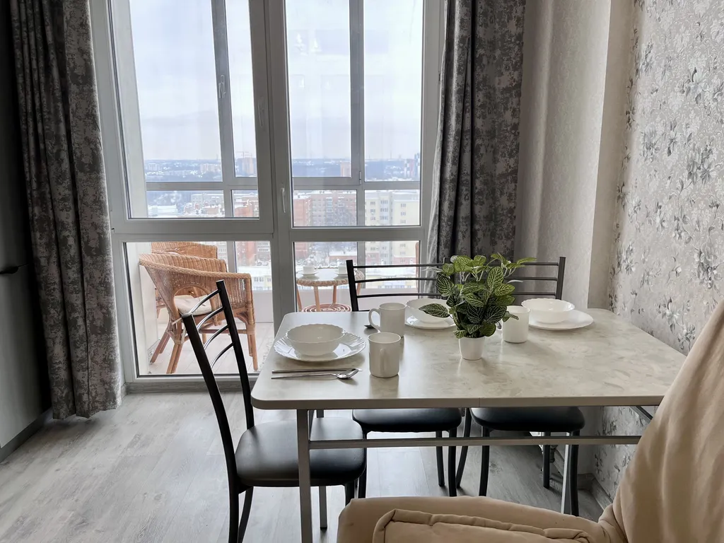 Квартира с панорамными окнами в центре города