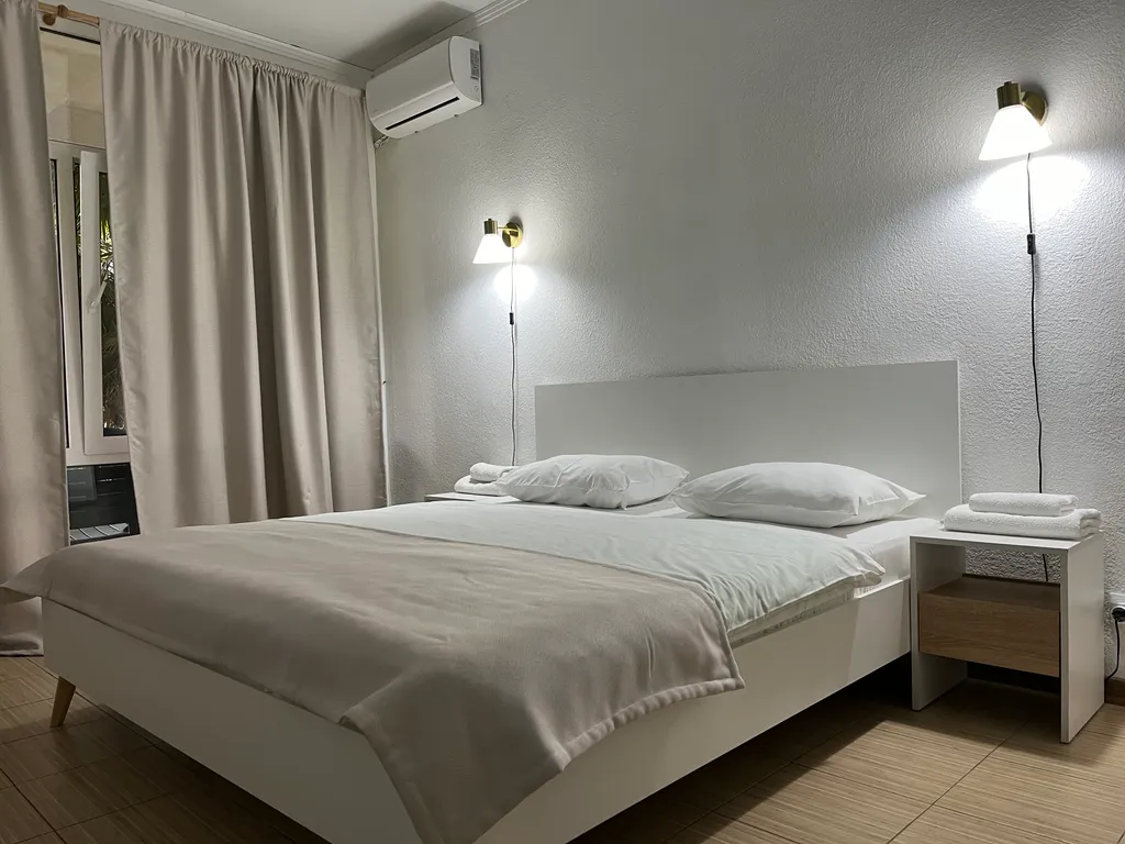 Квартира Квартира Уютный номер на 1 этаже с видом на парк с балконом. — Гагра