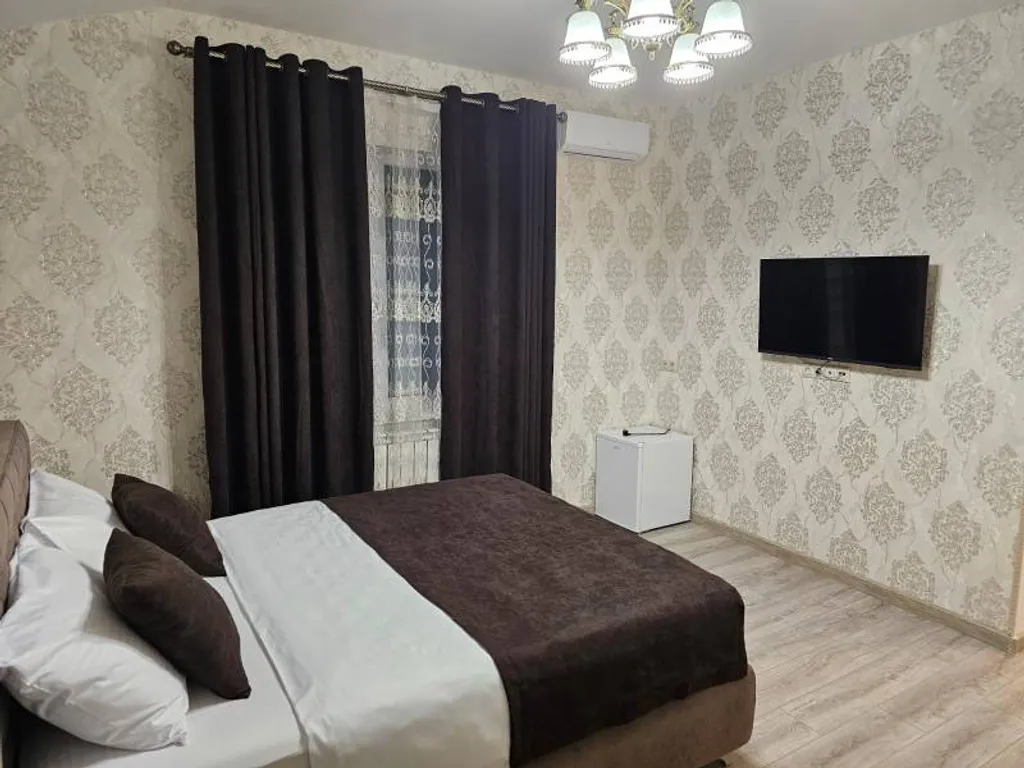 Двухместный люкс с одной большой кроватью