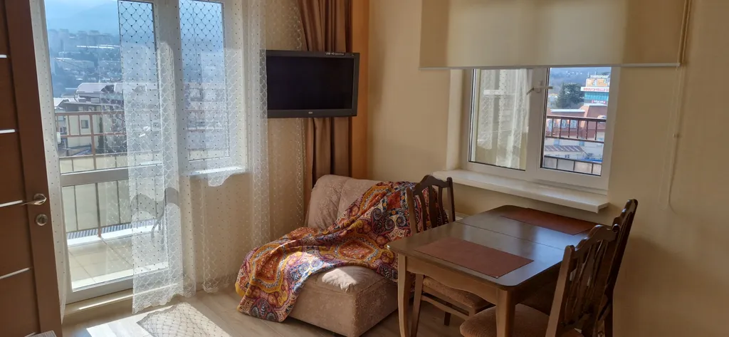 Стильная 1-комнатная квартира с панорамой на горы