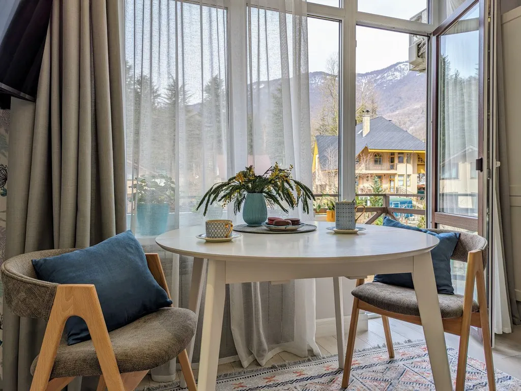 Двухуровневая квартира с балконом в центре