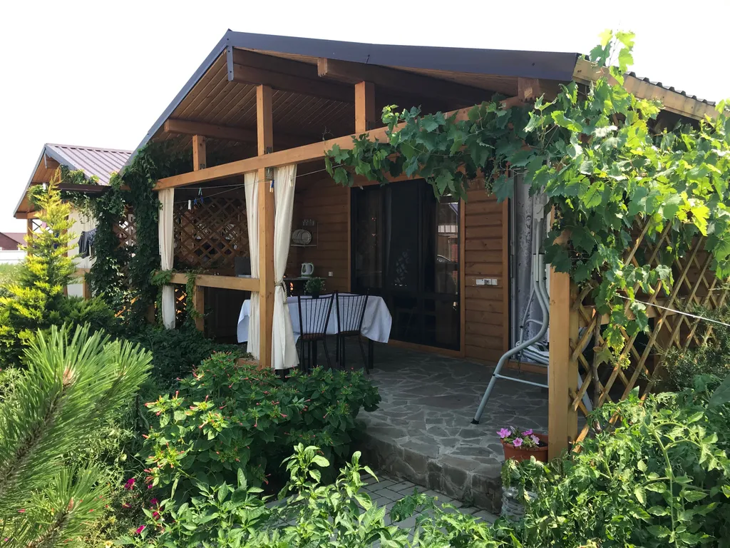 Коттедж Коттедж с террасой у моря — Кучугуры