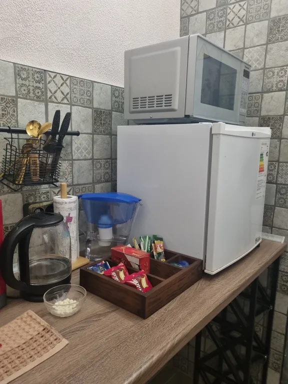 В историческом доме в центре города, уютные апартаменты, своя парковка