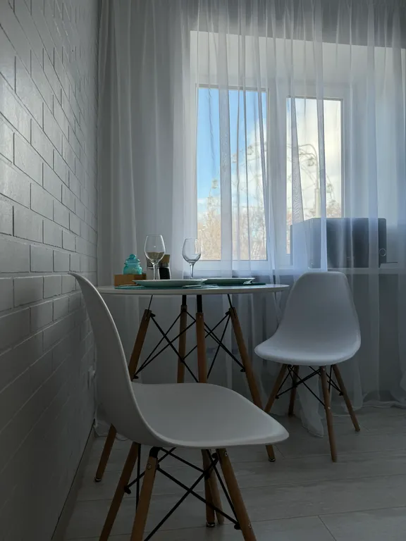 Стильная квартира с видом на колесо Обозрения