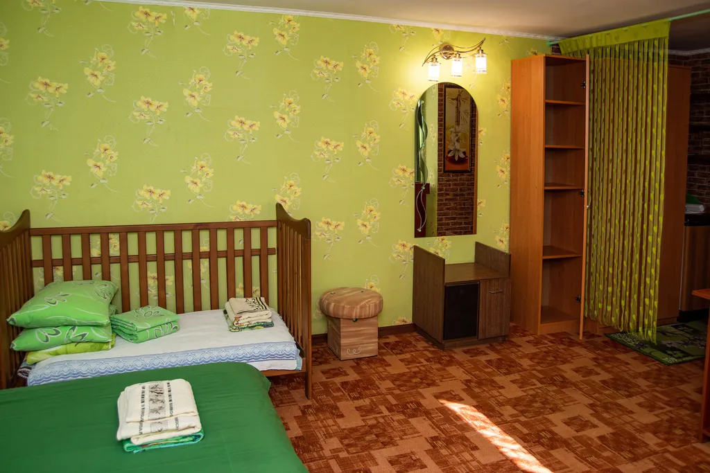 Семейные апартаменты с отдельным уютным двориком