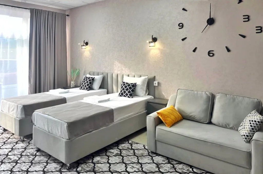 Комфортный семейный номер-студия с видом на горы