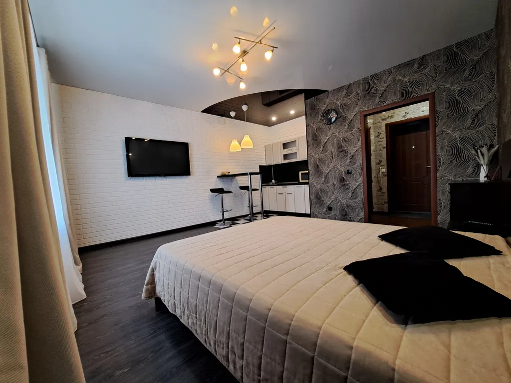 Студия с кондиционером на 14 этаже с видом на стадион