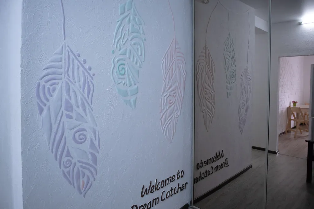 Атмосферные апартаменты на набережной в доме с колоннами Ловец Снов 1