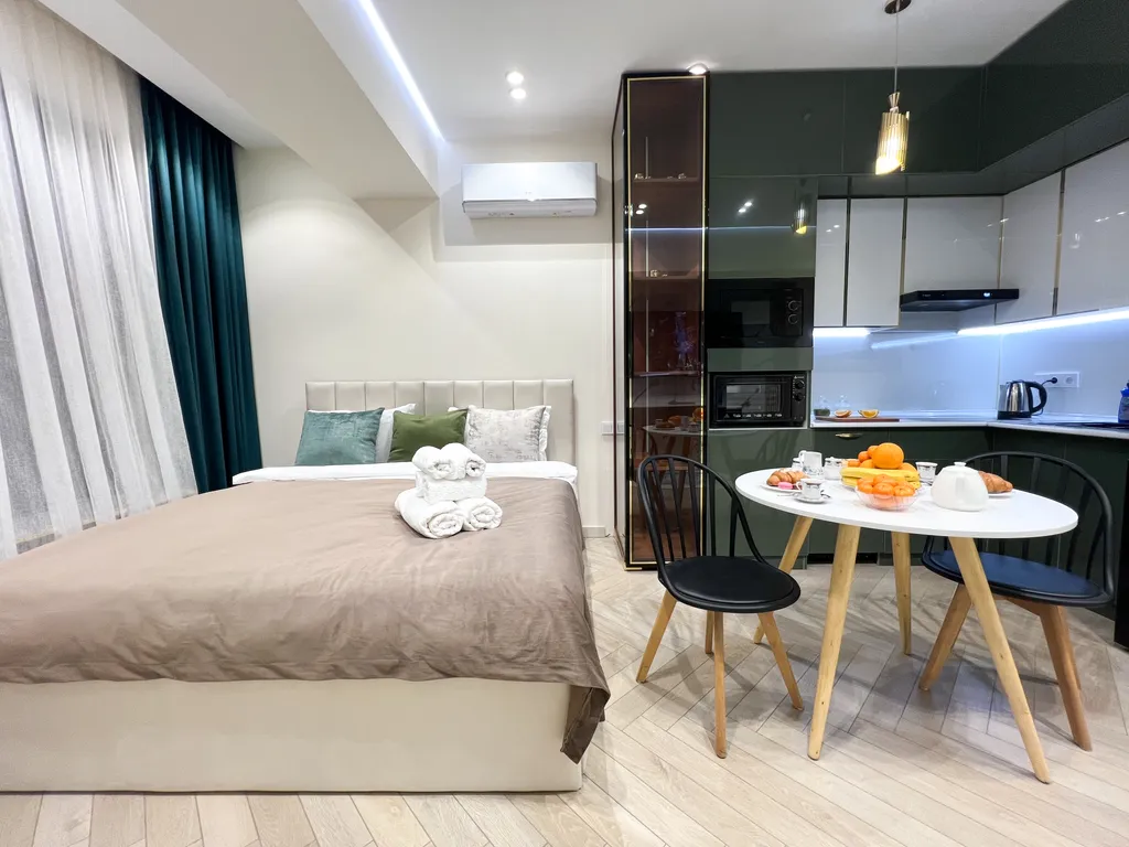 Уютная дизайнерская студия на 16 этаже в ЖК Modera Towers