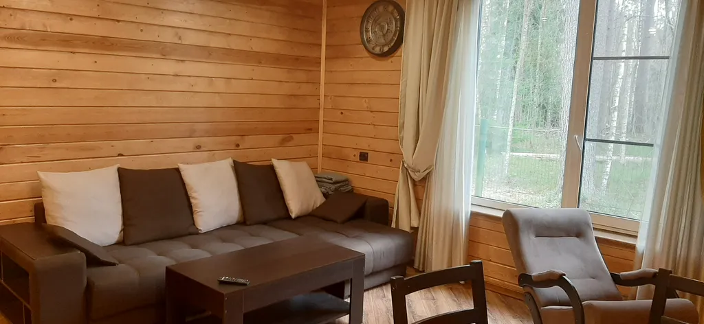 Комфортабельный коттедж с сауной на берегу водоема