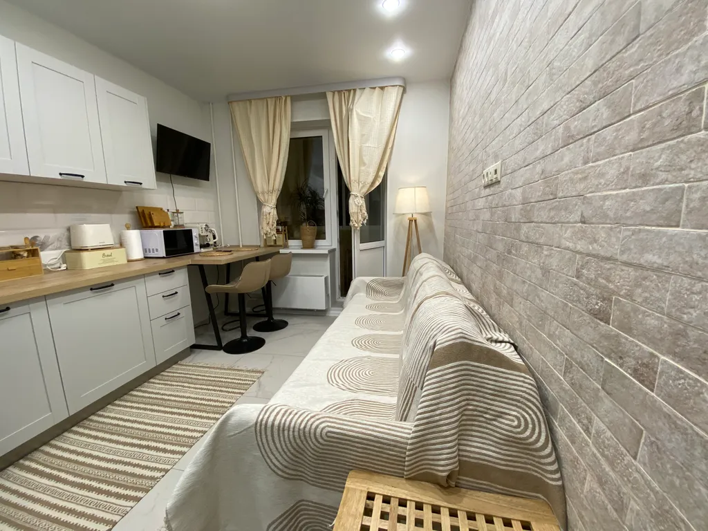 Апартамент Сканди с балконом и отдельной спальней