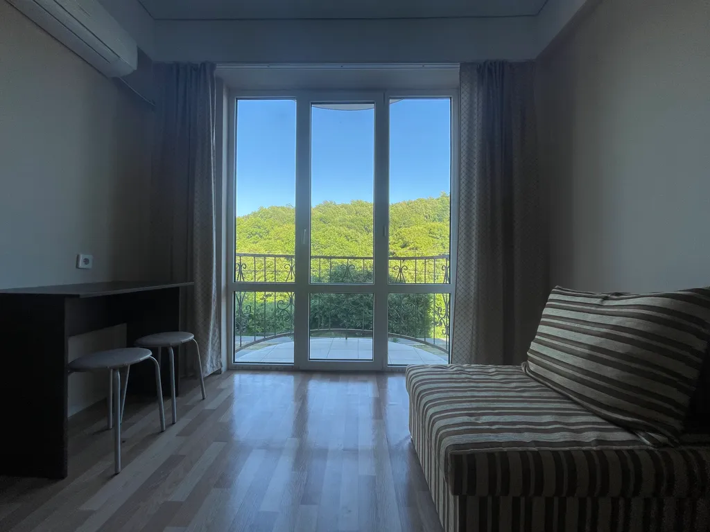 Просторный номер с уютным балконом