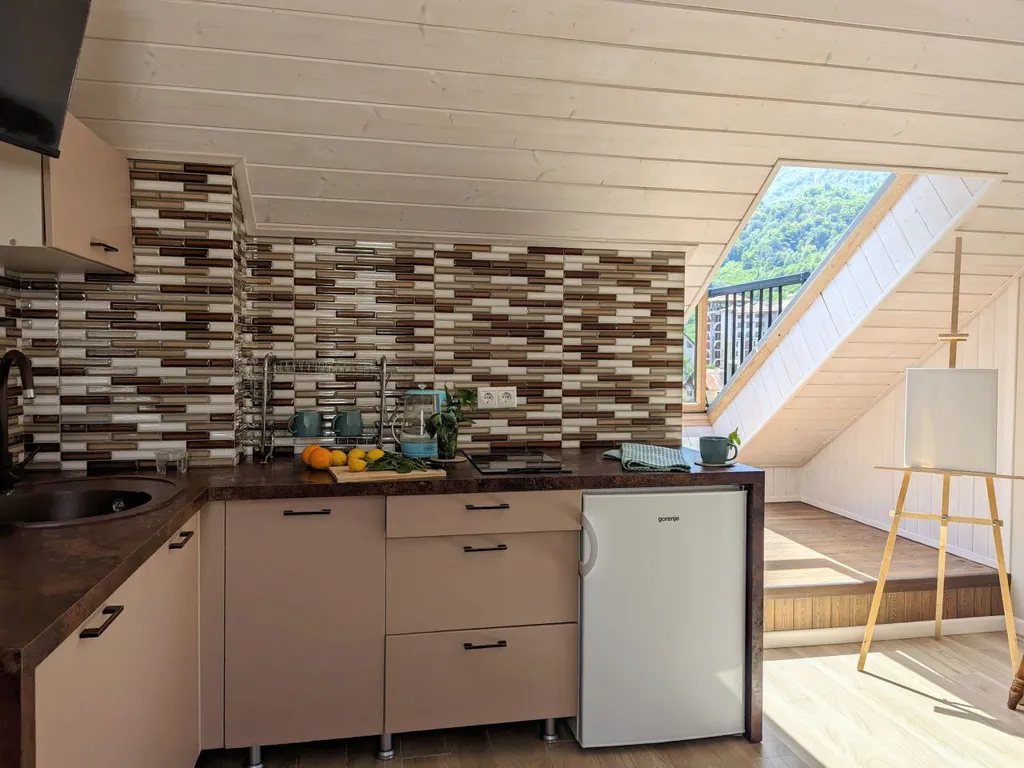 Роскошные двухуровневые апартаменты с панорамным видом на горы