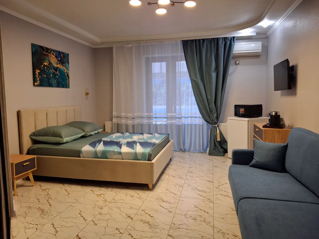 Большой четырёхместный люкс с выходом на бассейн 16