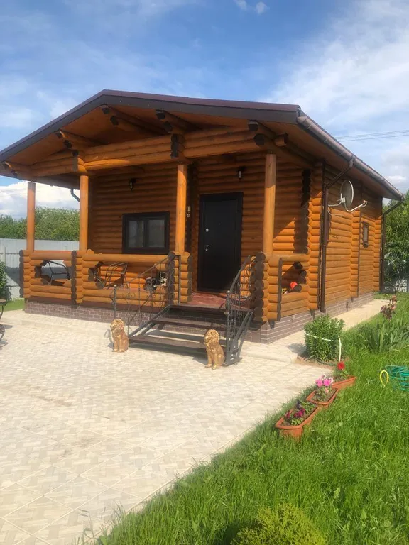 Современный дом из бревна