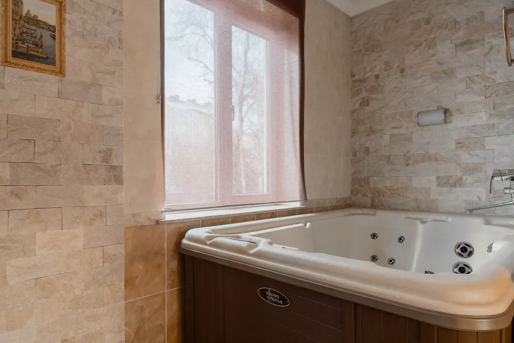 Люкс с джакузи, сауной и камином