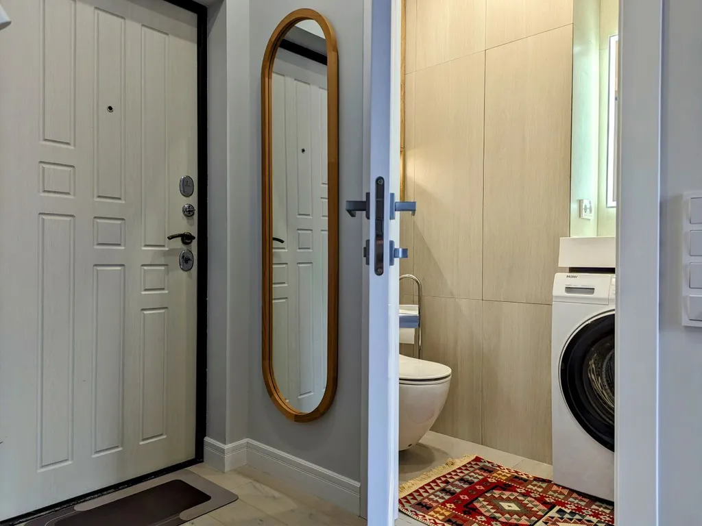 Двухуровневая квартира с балконом в центре