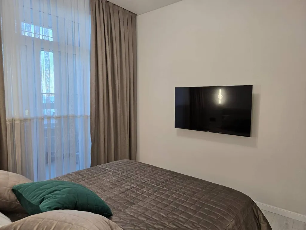 Уютная двухуровневая квартира на Берегу моря