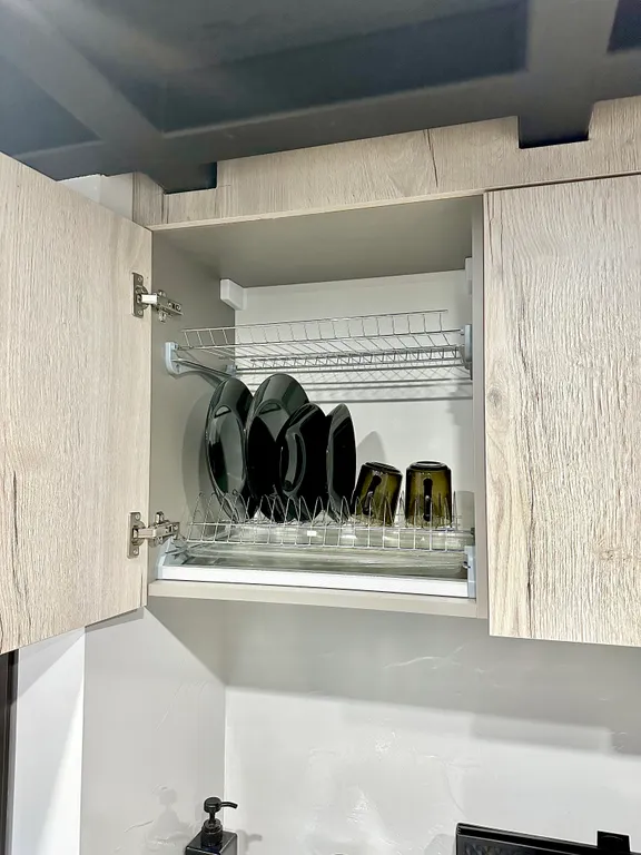 Двухуровневая студия с дизайнерским ремонтом в стиле лофт