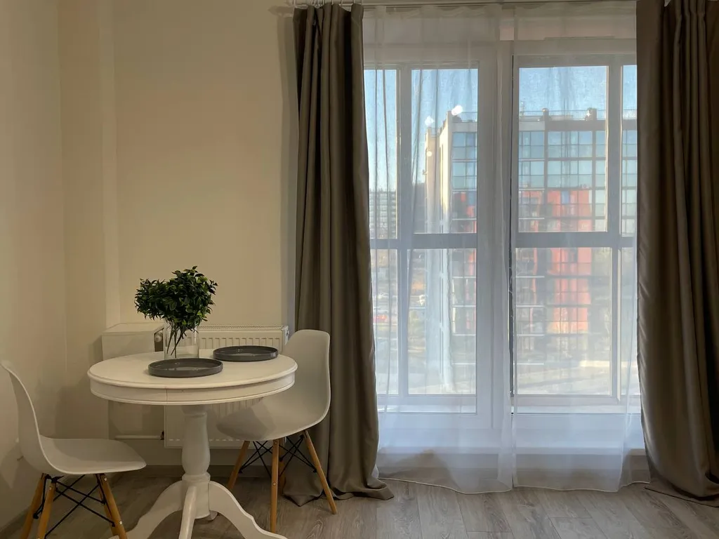 Уютная студия на высоком этаже