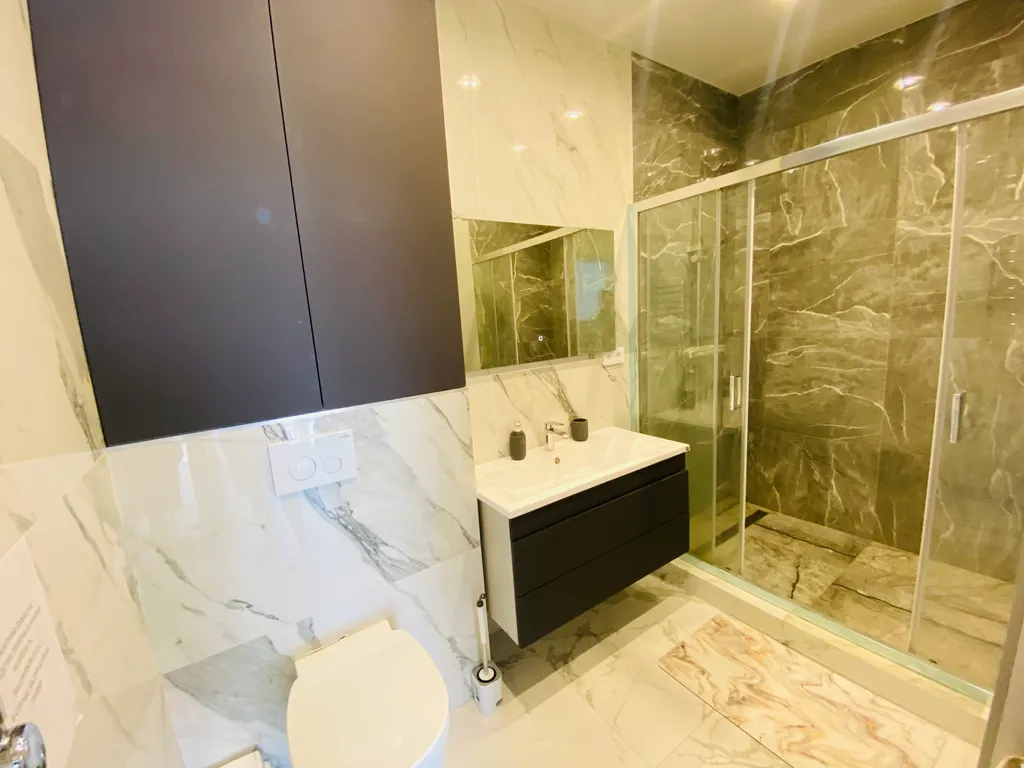 Трехэтажный коттедж с баней и бассейном