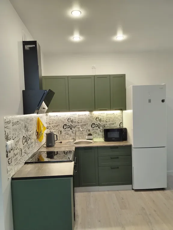 Квартира-студия с видом на город среди гор