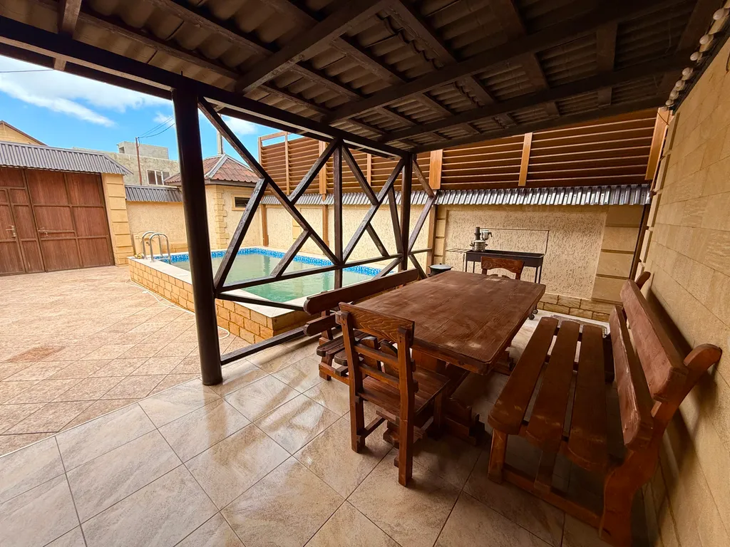 Коттедж дом с бассейном у берега Каспийского моря