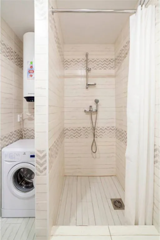 студия с большой кроватью и креслом- кроватью