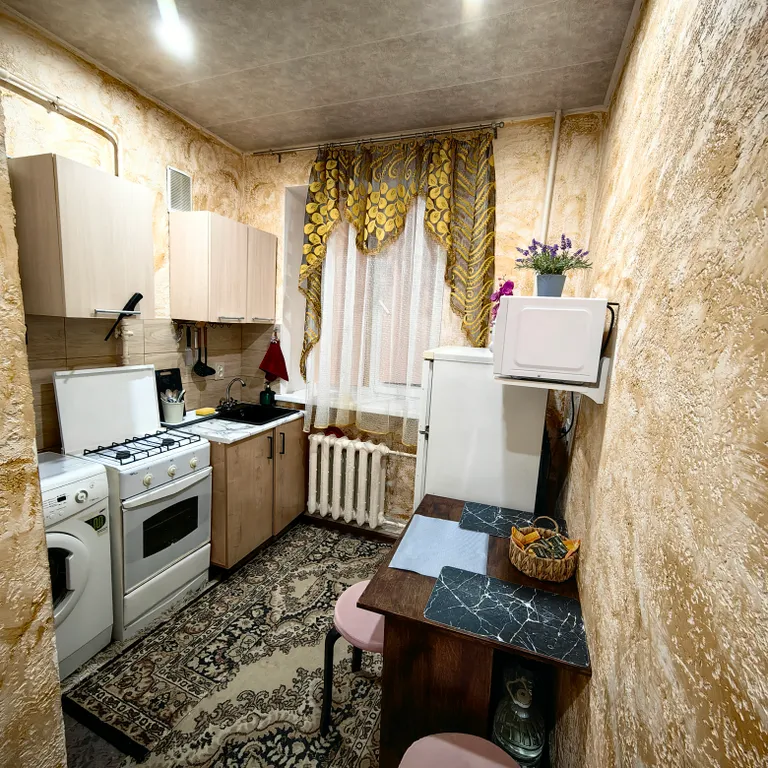 Квартира Квартира Уютная квартирка в тихом месте — Волгоград