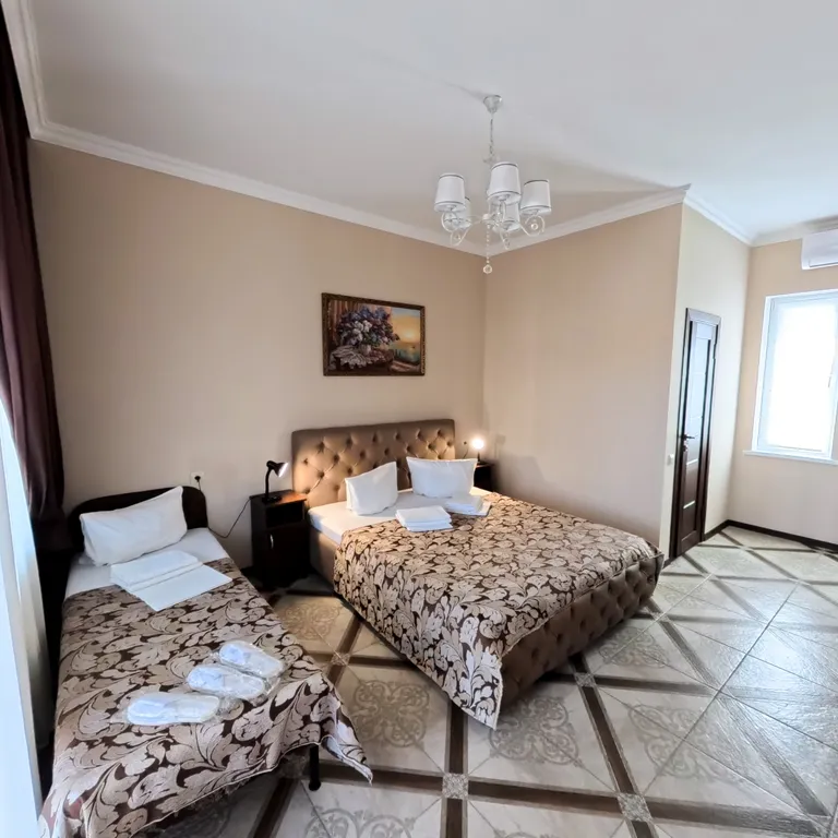 Квартира Квартира Трёхместный номер комфортный с 1 двуспальной кроватью и 1 односпальной — Кучугуры