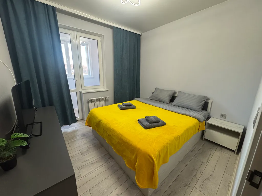 Квартира у Сити-молла с видом на рассвет и горы