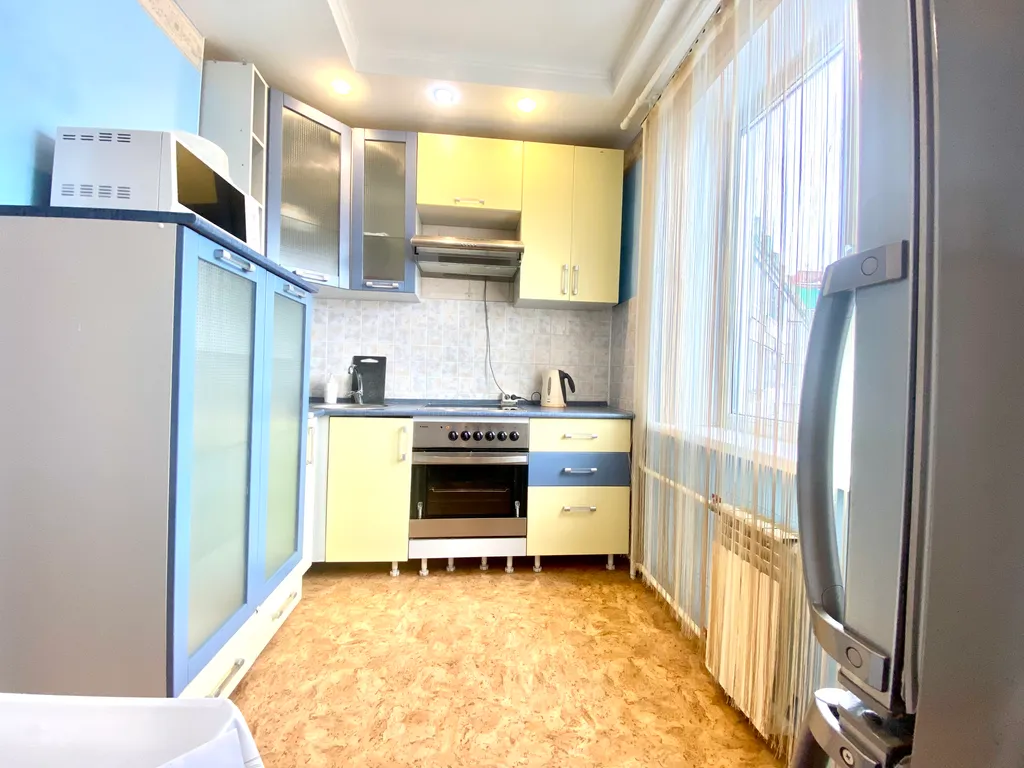 Квартира в центре города в тихом дворике с видом из окон на парк