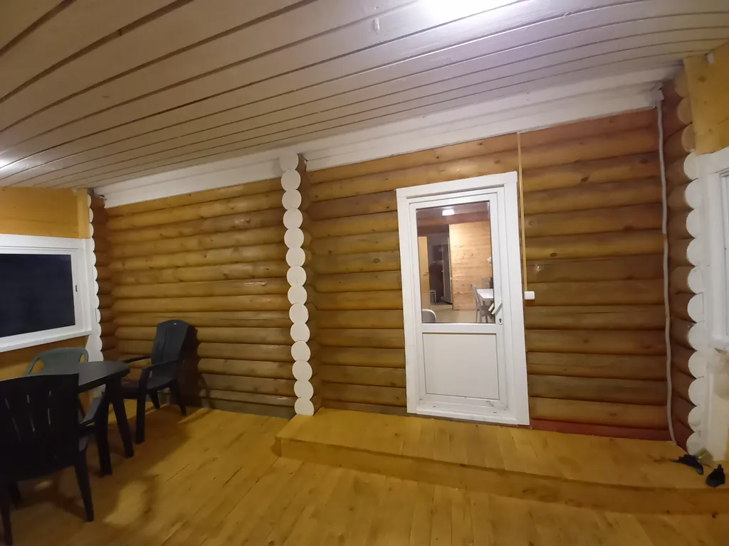 Домик из сосны в городе  С.