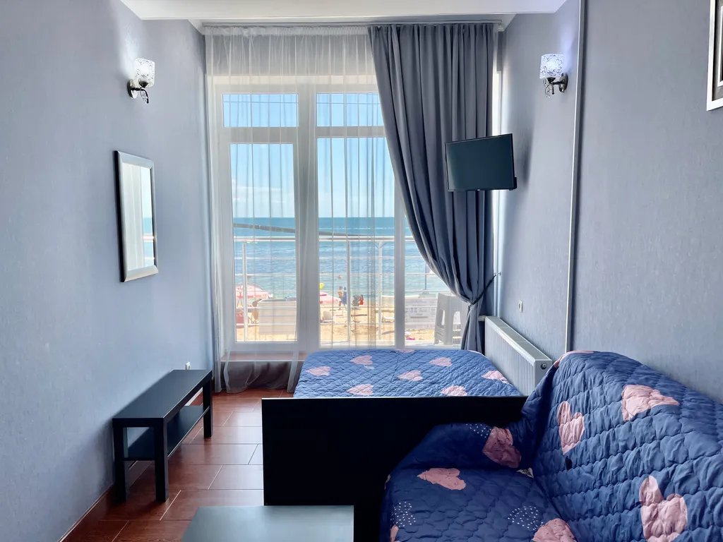 Апартаменты с видом на море с балконом.