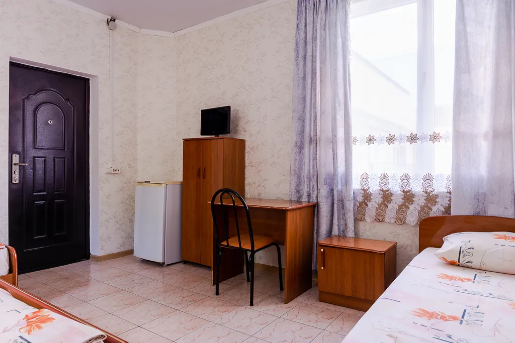 Четырёхместный номер с удобствами, парковка в подарок