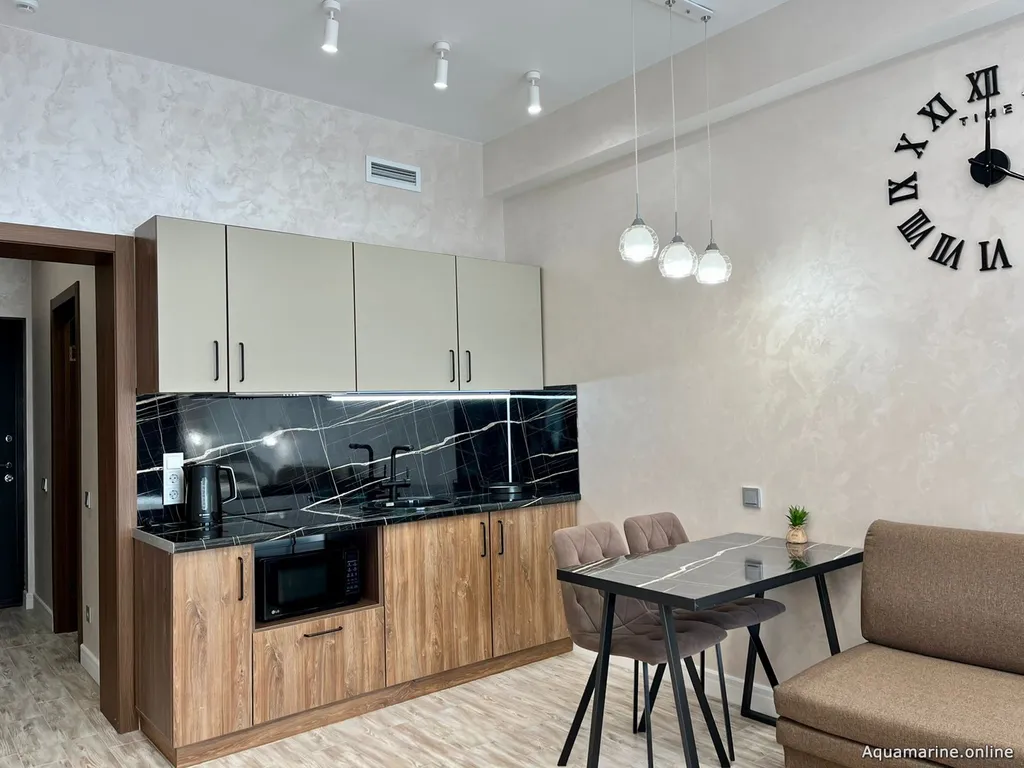 Апартаменты с видом на море и бассейн