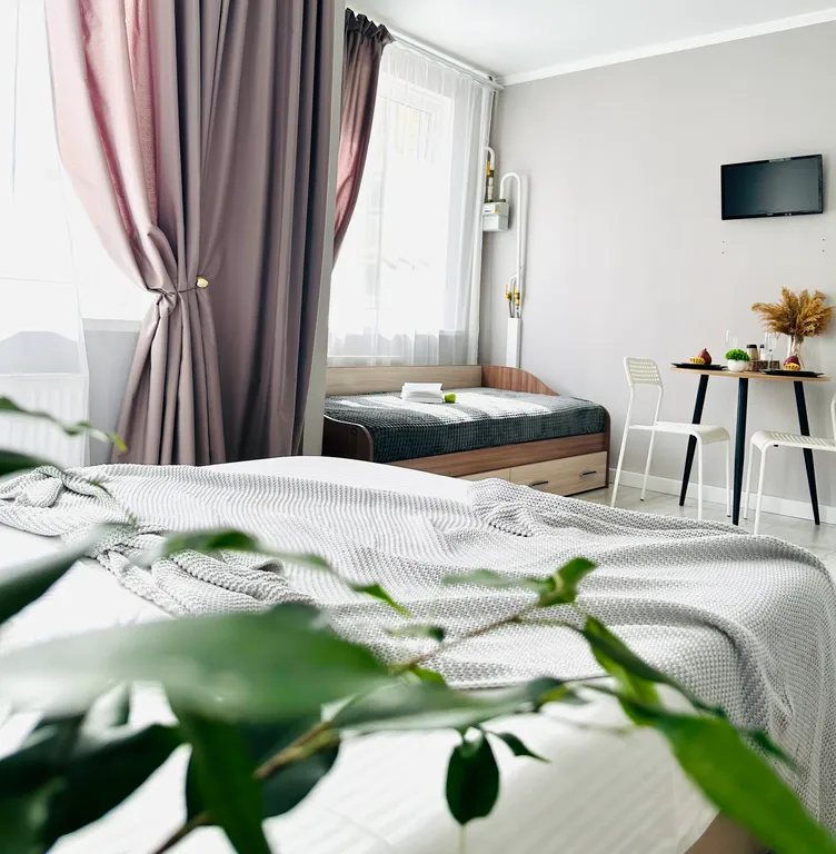 Студия для троих