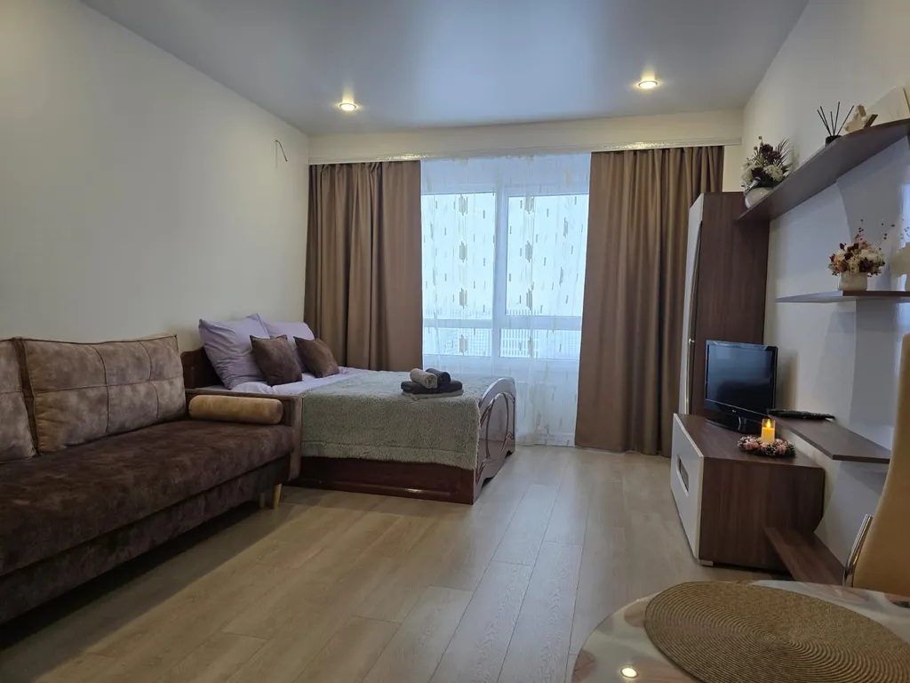 Уютная студия с видом на город