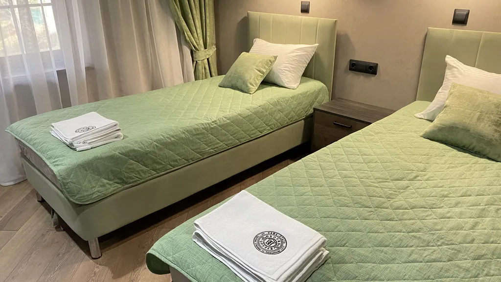 Уютные апартаменты с двумя односпальными кроватями