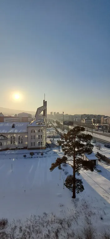 Студия с панорамным видом на город