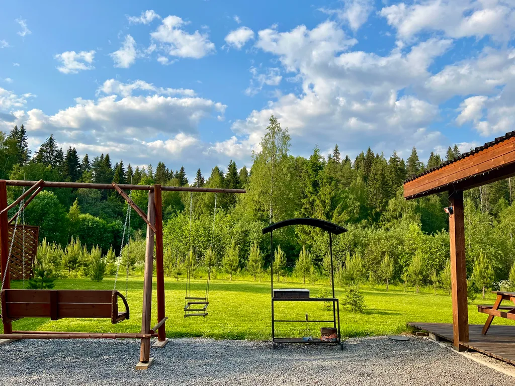 Коттедж с сауной и панорамным остеклением