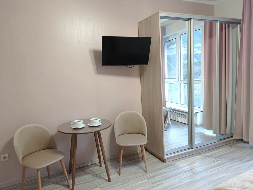 Уютная студия с панорамным видом «Дыхание гор»