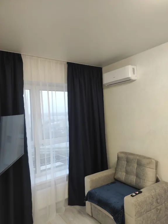 Уютная светлая квартира с видом на город