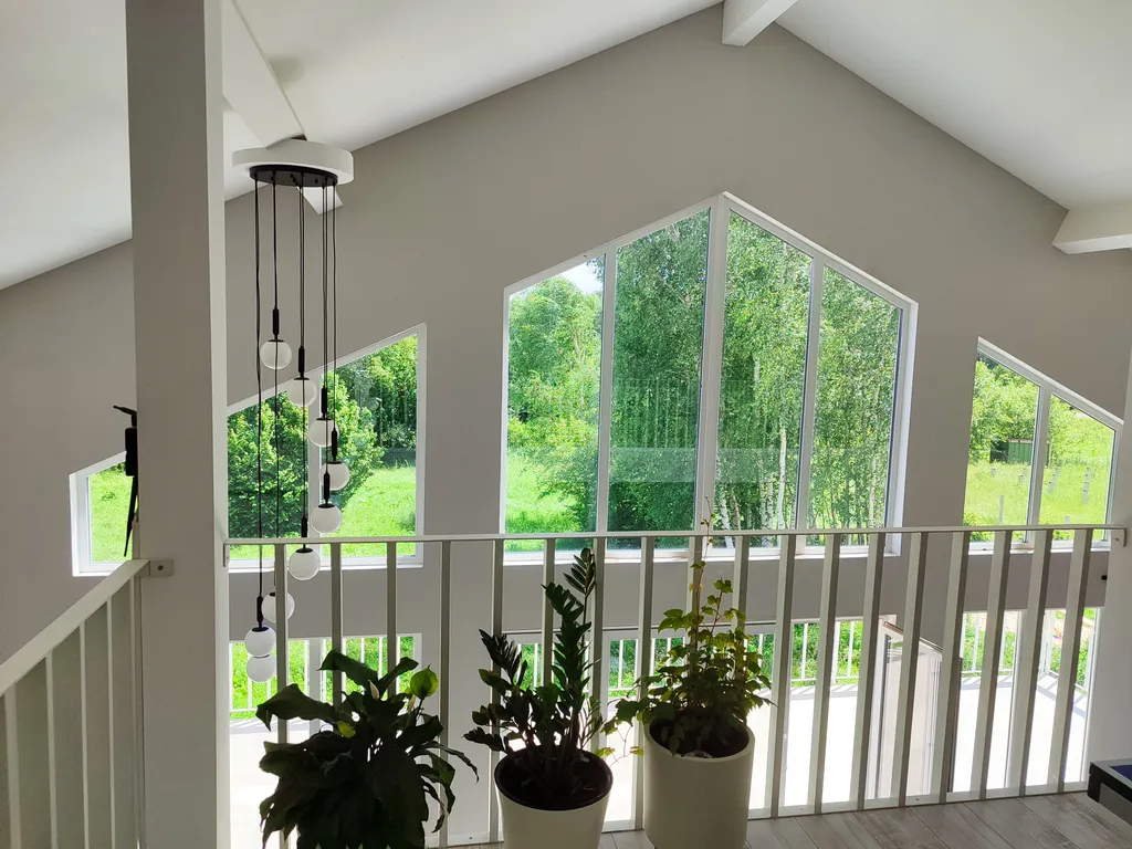 Современный дом с панорамными окнами и сауной