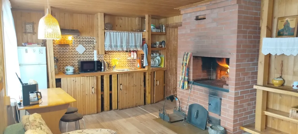 Уютный деревянный дом с мансардой и русской печкой